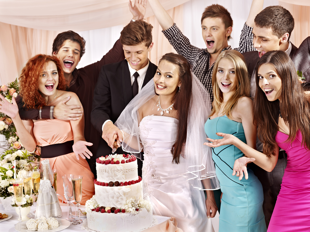 Group people at wedding table.