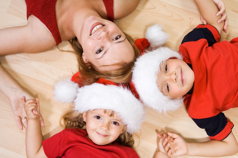 Woman and kids at christmas time