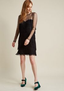 Affordable Little Black Bridesmaid Dress from ModCloth | Fab Fringe Long Sleeve Dress