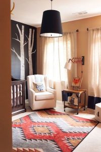 A rug is a perfect way to add a splash of color and warmth to your neutral nursery