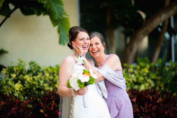 Mother Daughter Wedding Moments | Bride and her mother laughing at wedding