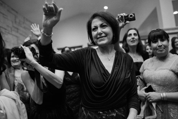 Mother of the Bride waving goodbye