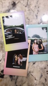 Take instant photos for guests to take home as keepsakes from a one-of-a-kind drive-through baby shower.
