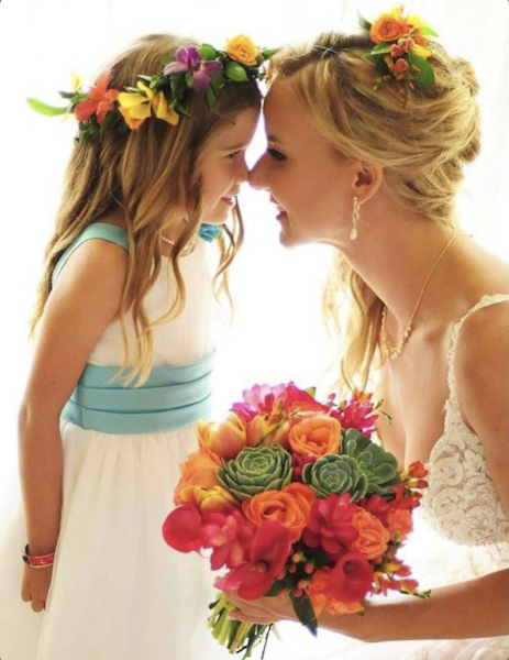 Bride and flower girl matching floral crowns bright tropical wedding flowers with succulents