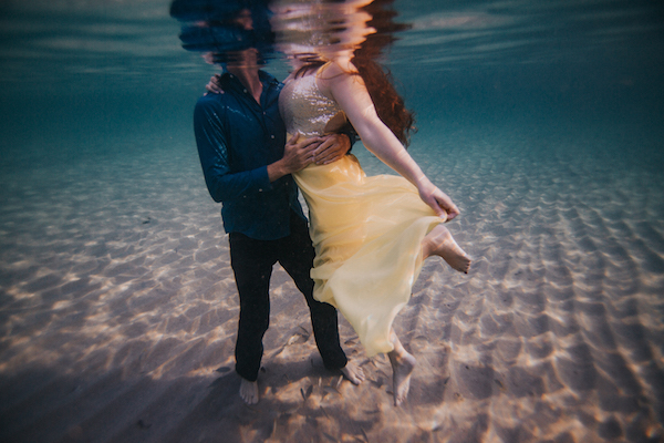 engagement photo in ocean