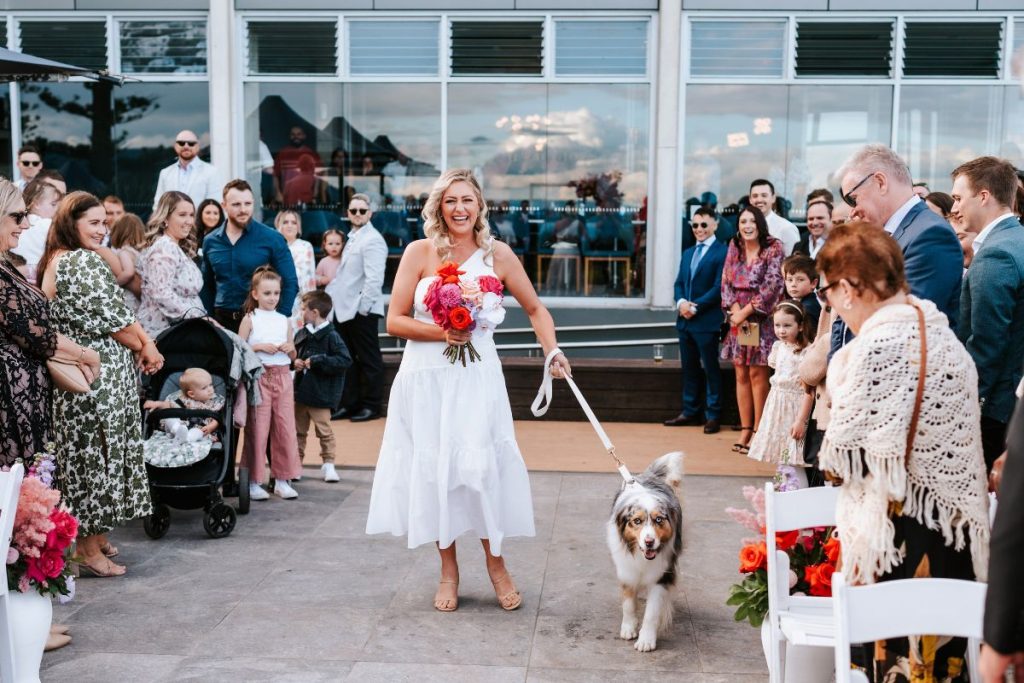 down the aisle with dog