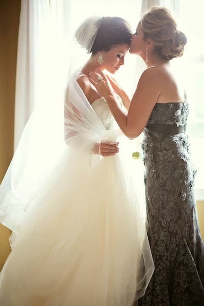 Mother of the store bride getting ready