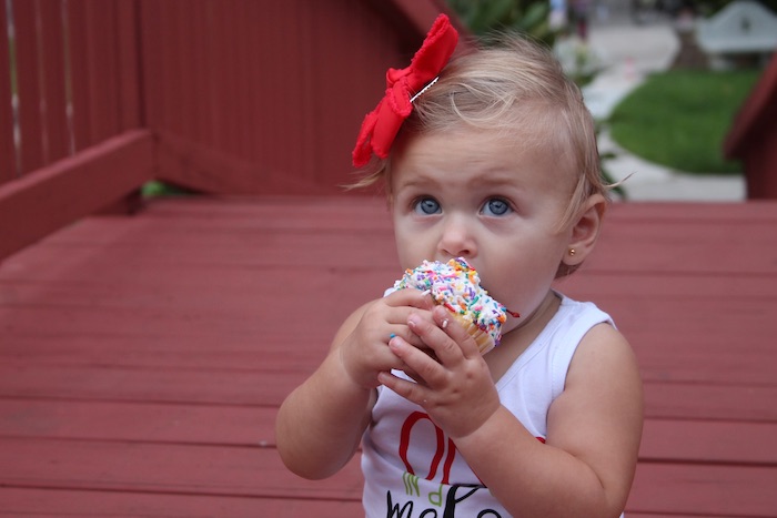 baby eating cupcake